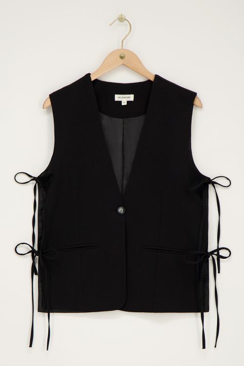 Zwart gilet met strikjes aan de zijkant