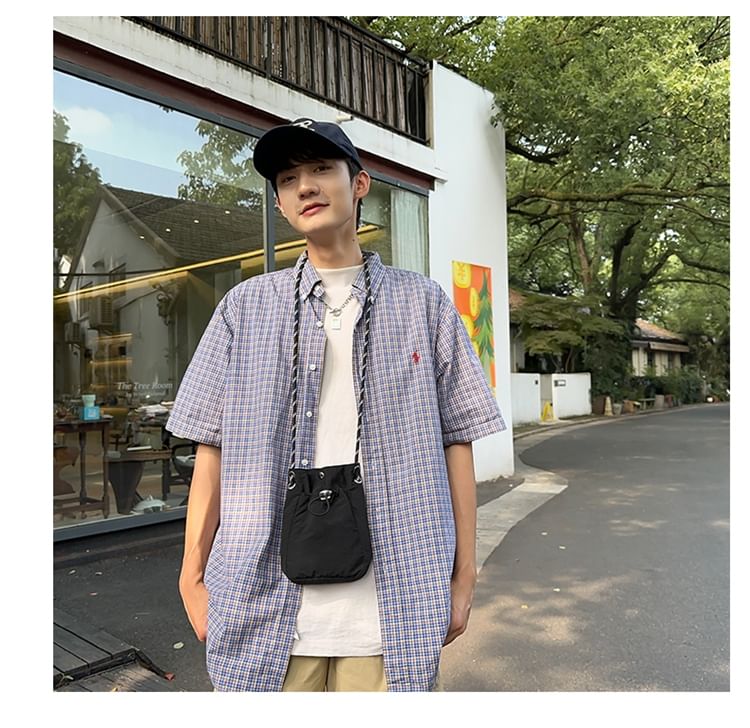 Bolso - Effen nylon crossbodytas met trekkoord