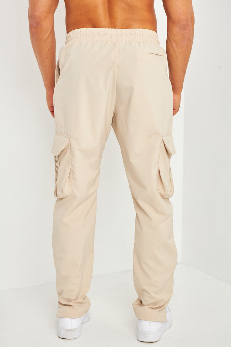 Pantalon cargo beige coupe droite détail zip aux chevilles