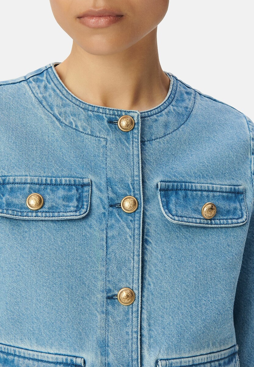 Jaqueta jeans IKKS com gola redonda e mangas compridas