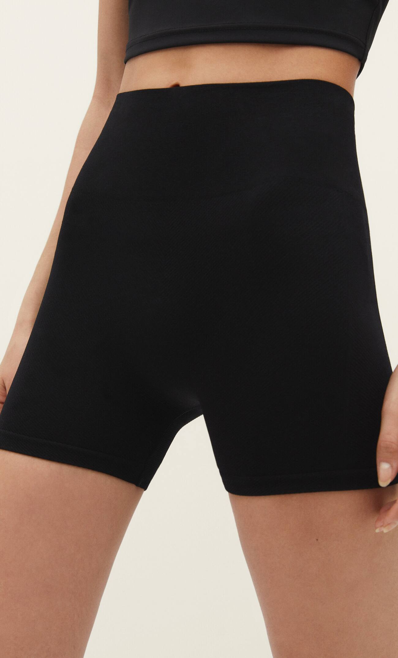 Shorts esportivos sem costura com padrão espinha de peixe