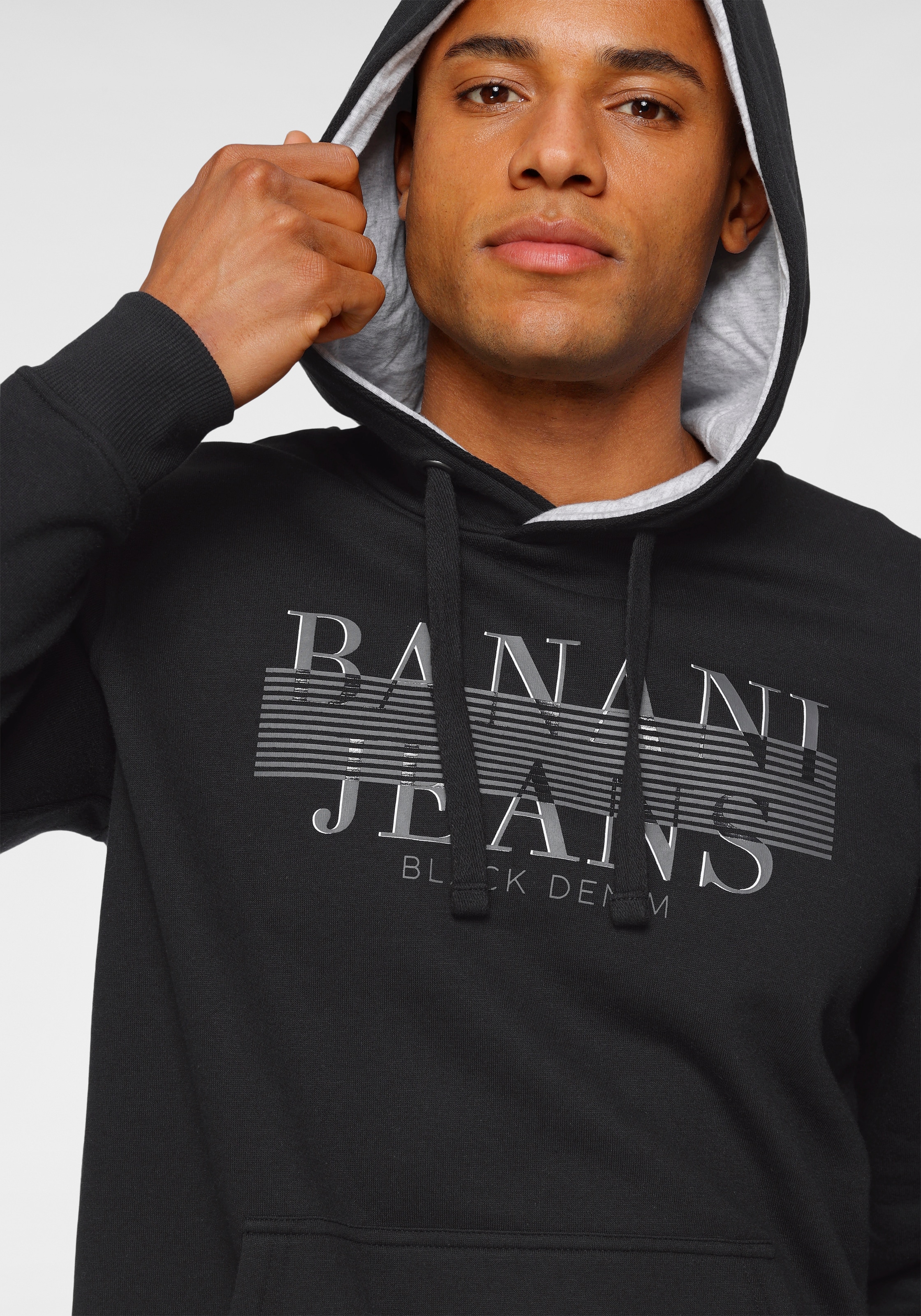 Bruno Banani Kapuzensweatshirt , schmale Passform,  bedrucktes Design,  aus Baumwollmischung