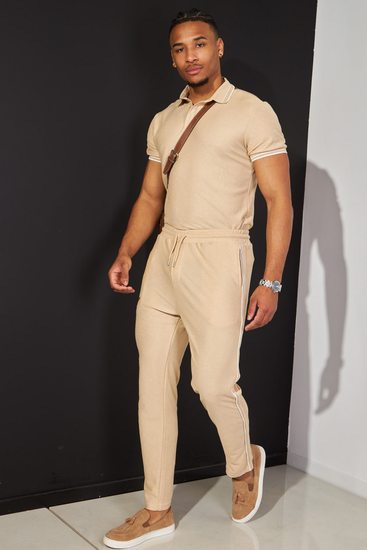 Ensemble 2 pièces polo + pantalon beige à détail blanc