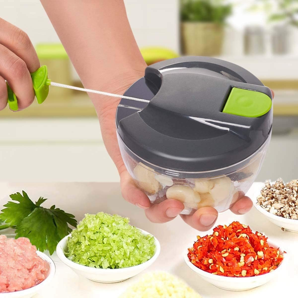 (12.6x9.3cm) Handbetriebener Zerkleinerer mit Edelstahlklinge für Obst / Gemüse - Grau / Grün