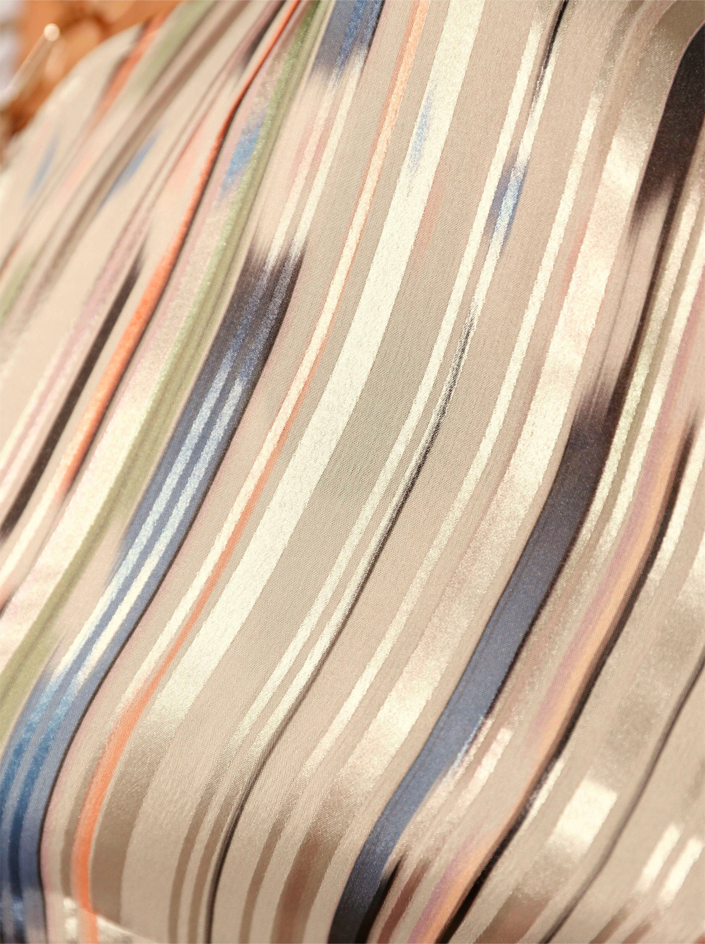 Bluse in beige-mandarine-bedruckt