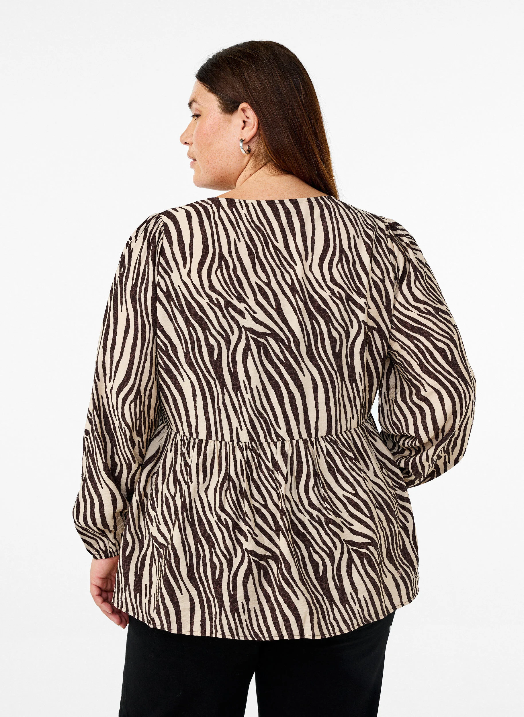 Peplumbluse med bindebånd og zebraprint