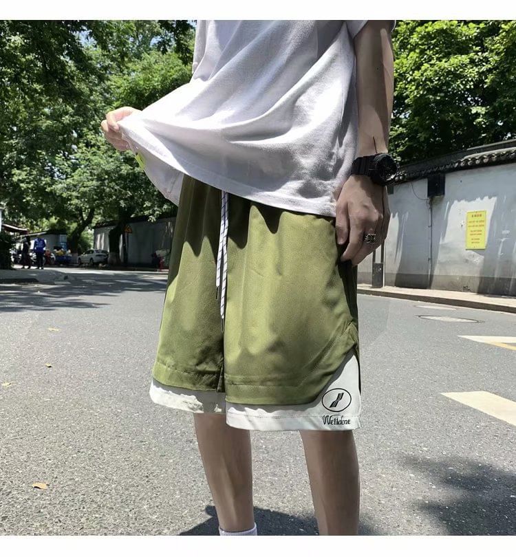 Macho - Tweekleurige shorts met wijde pijpen en trekkoord in de taille