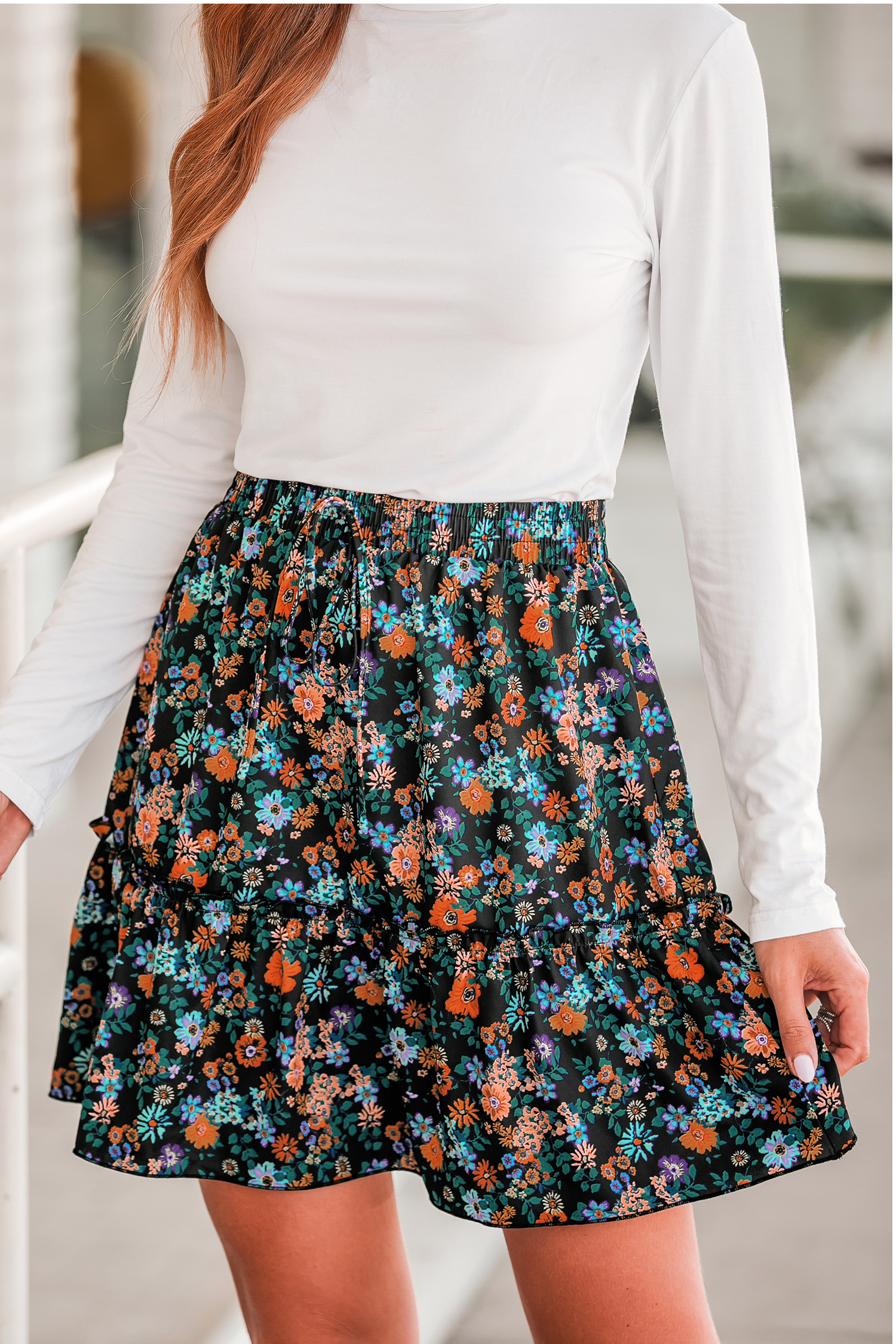 Jupe mini à cordon et imprimé floral