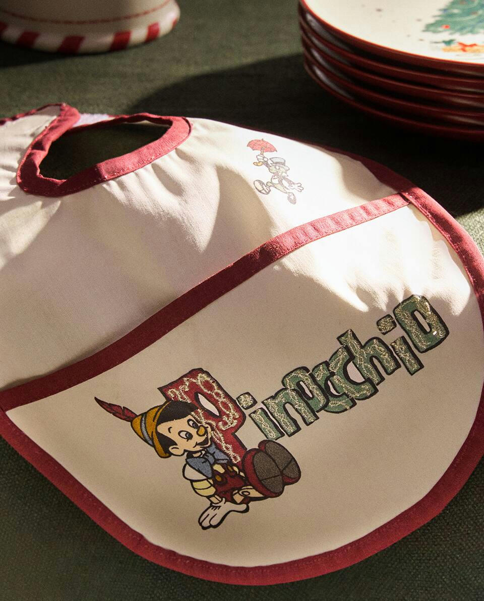 BABADOR INFANTIL DE NATAL DO PINÓQUIO DA DISNEY, REVESTIDO DE RESINA
