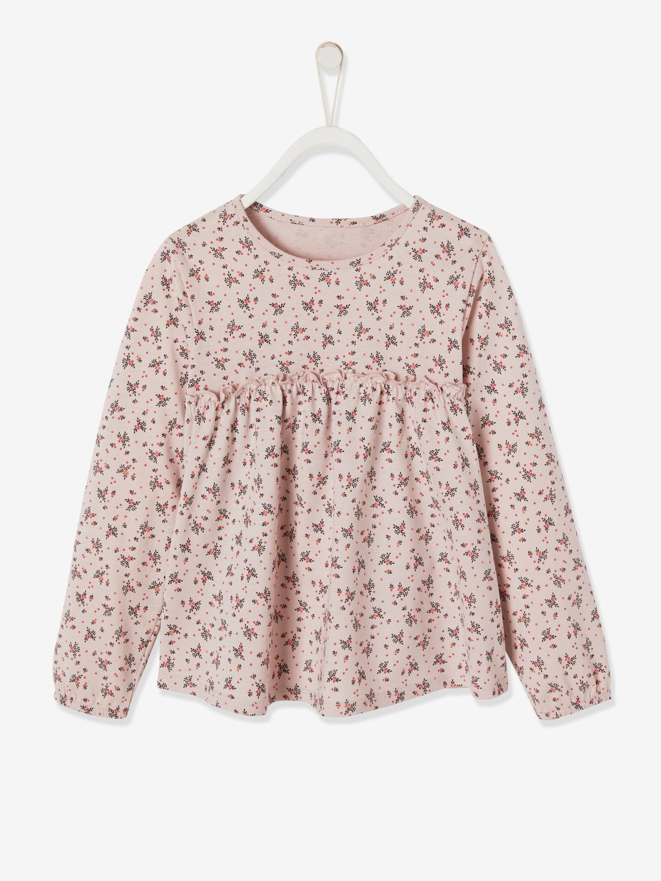 Blusa rosa claro com estampa floral para meninas.
