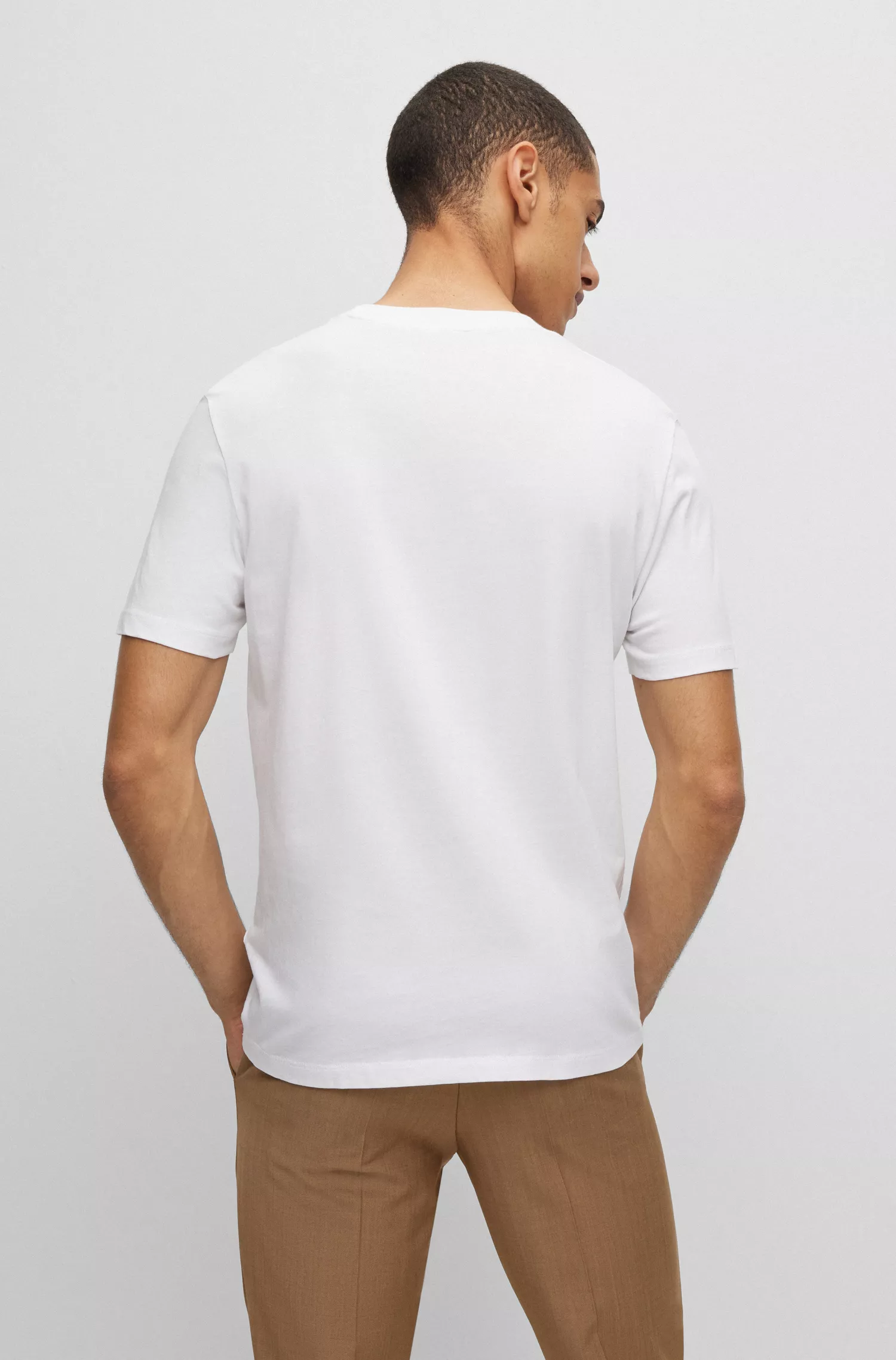 Camiseta HUGO vermelha em malha de algodão com estampa de tigre.