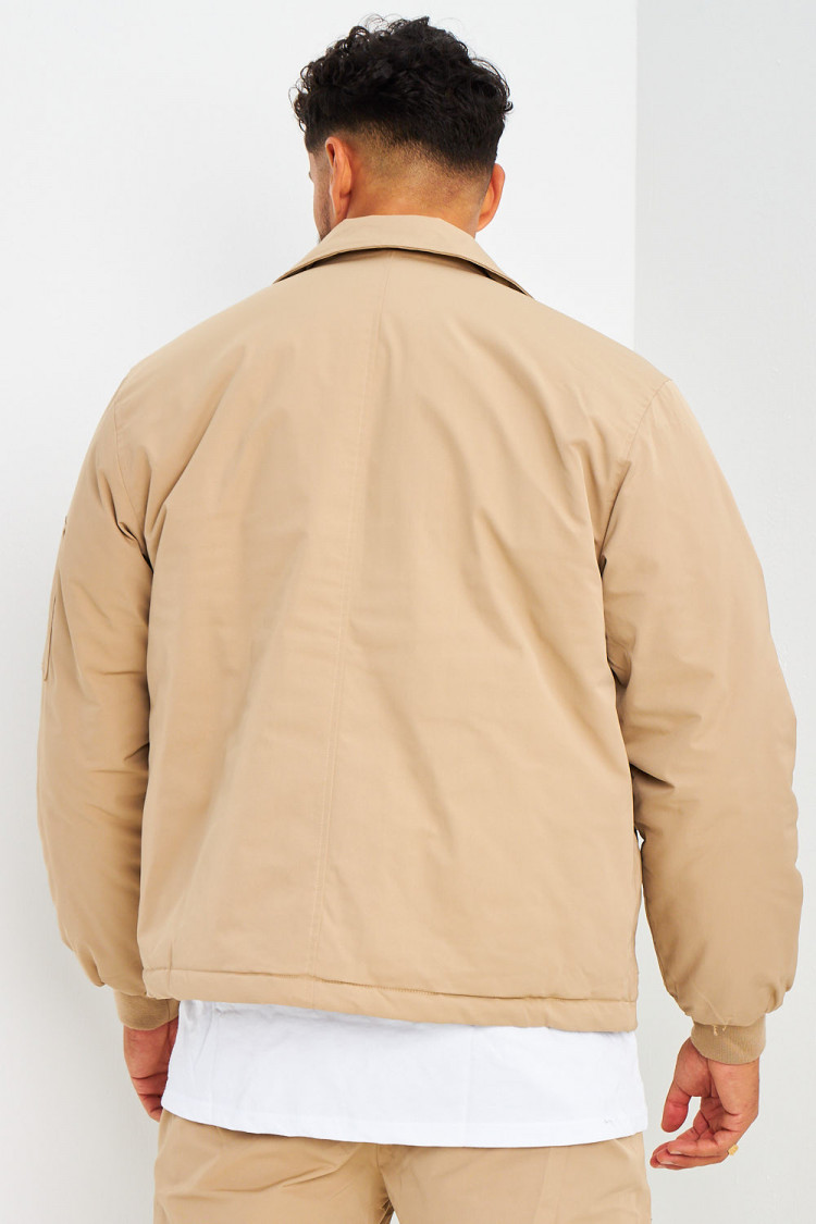 Blouson beige foncé à poches zippées