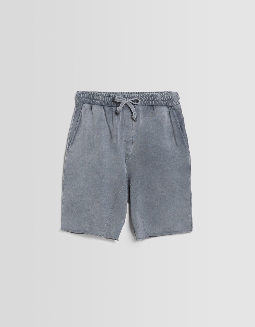 Bermudas de pelúcia com efeito desbotado