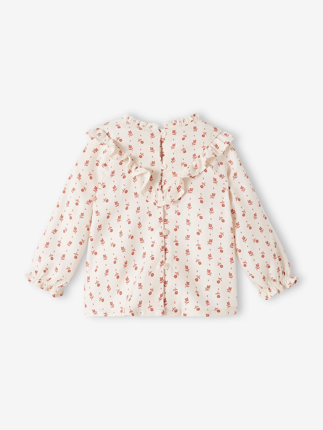 Blusa fluida com estampa floral para bebê na cor cru.