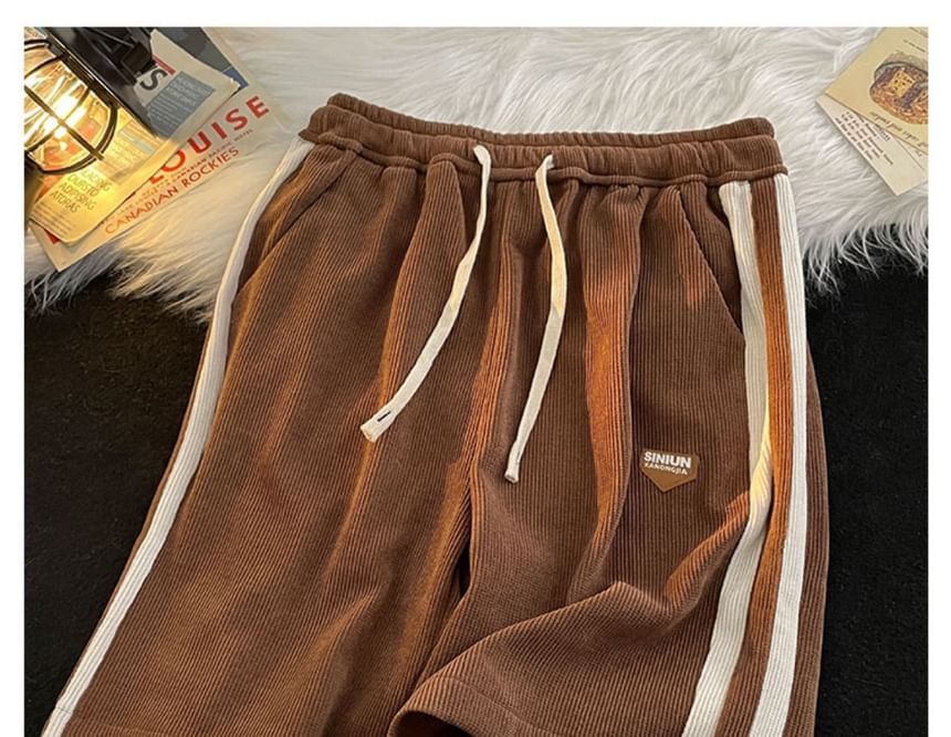 Femilina - Gestreepte joggingbroek met trekkoordtaille
