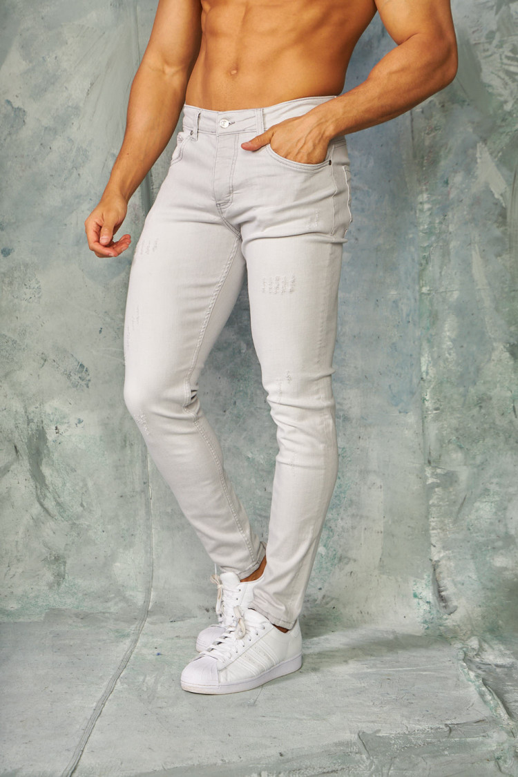 Jeans skinny gris clair griffé