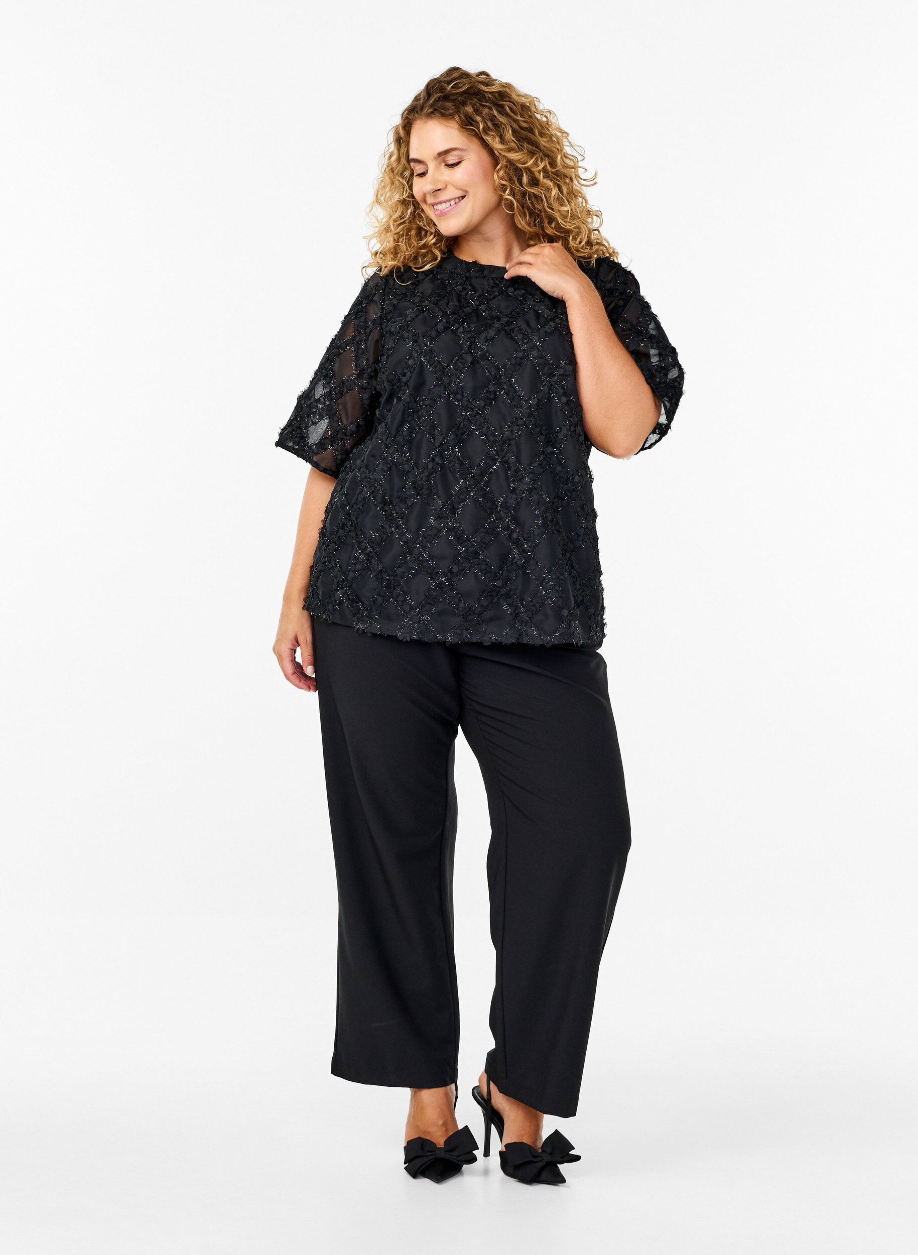Bluse med harlequin mønster