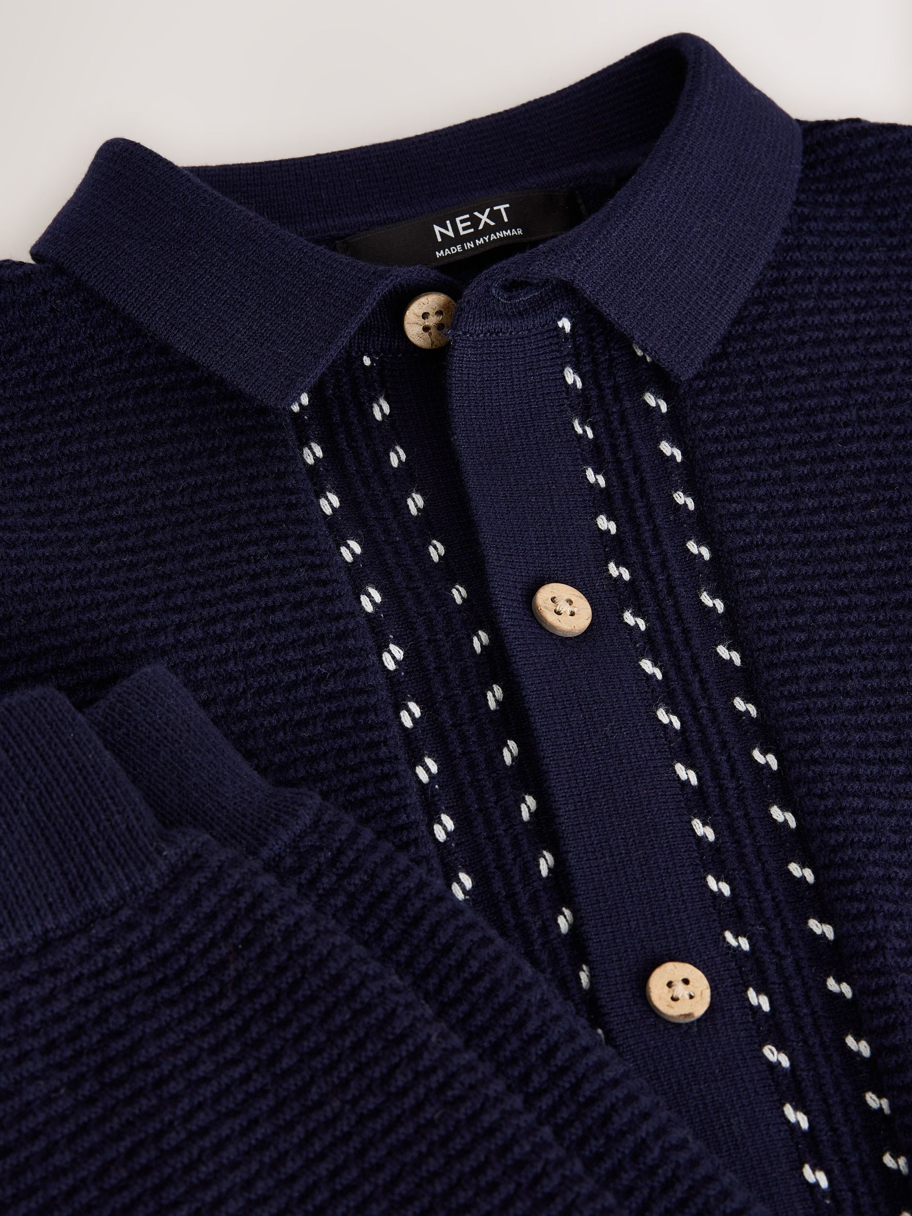 Donkerblauw - Set met getextureerd gebreid poloshirt met knoopsluiting en short (3-16jr)