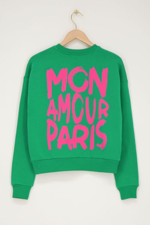 Groene sweater met roze 