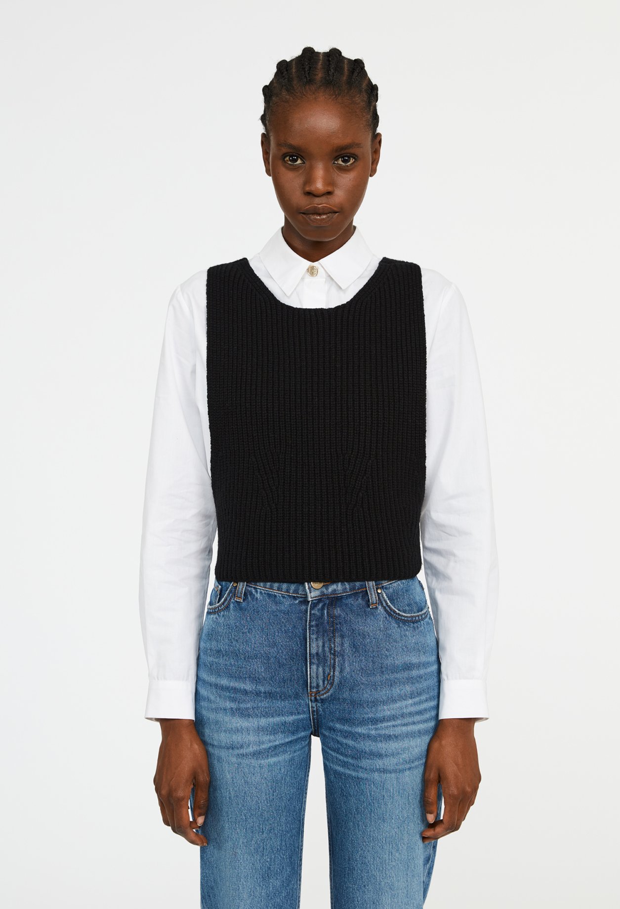 Pull sans manche croise dans le dos