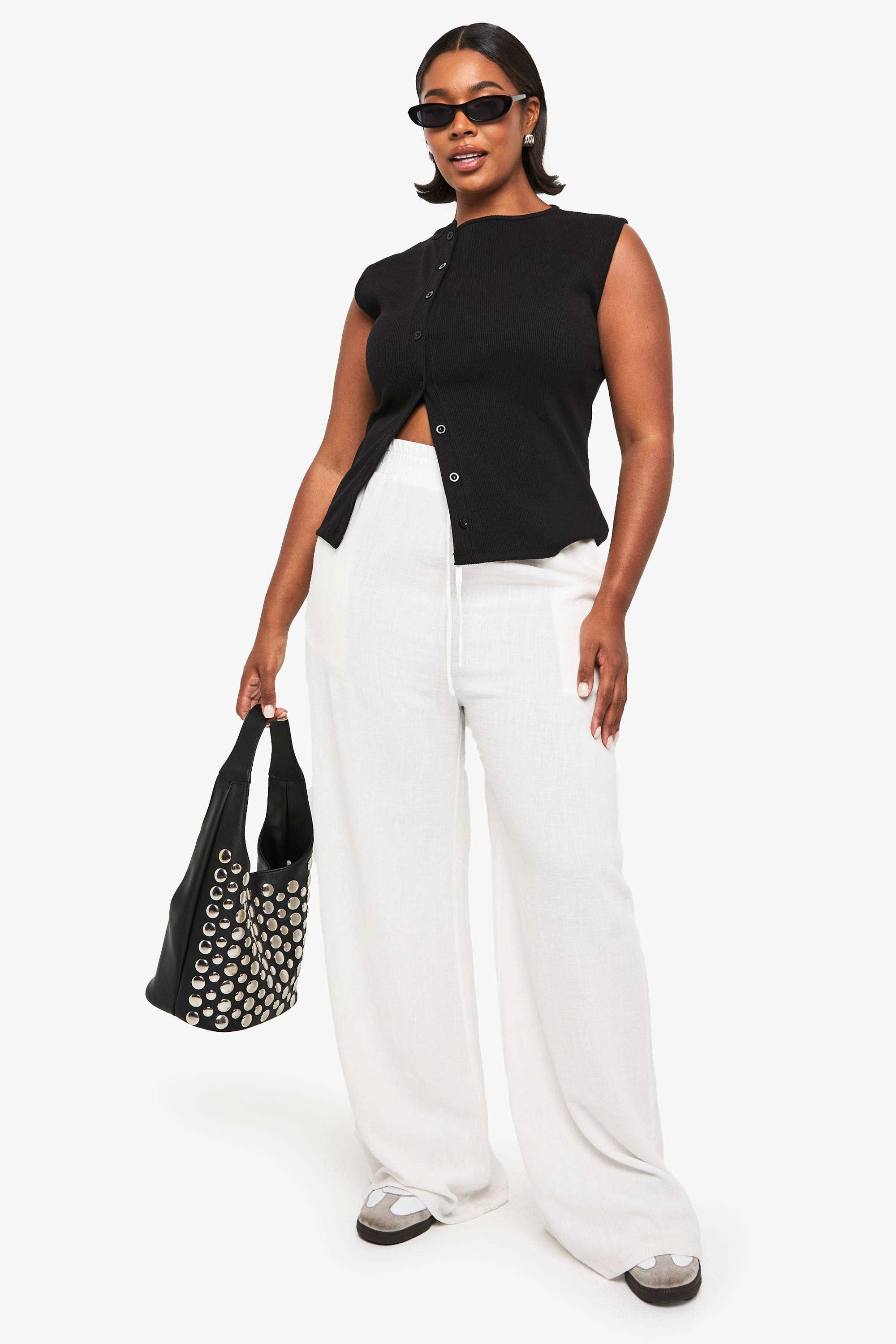 boohoo Haut grande taille sans manches asymétrique boutonné
