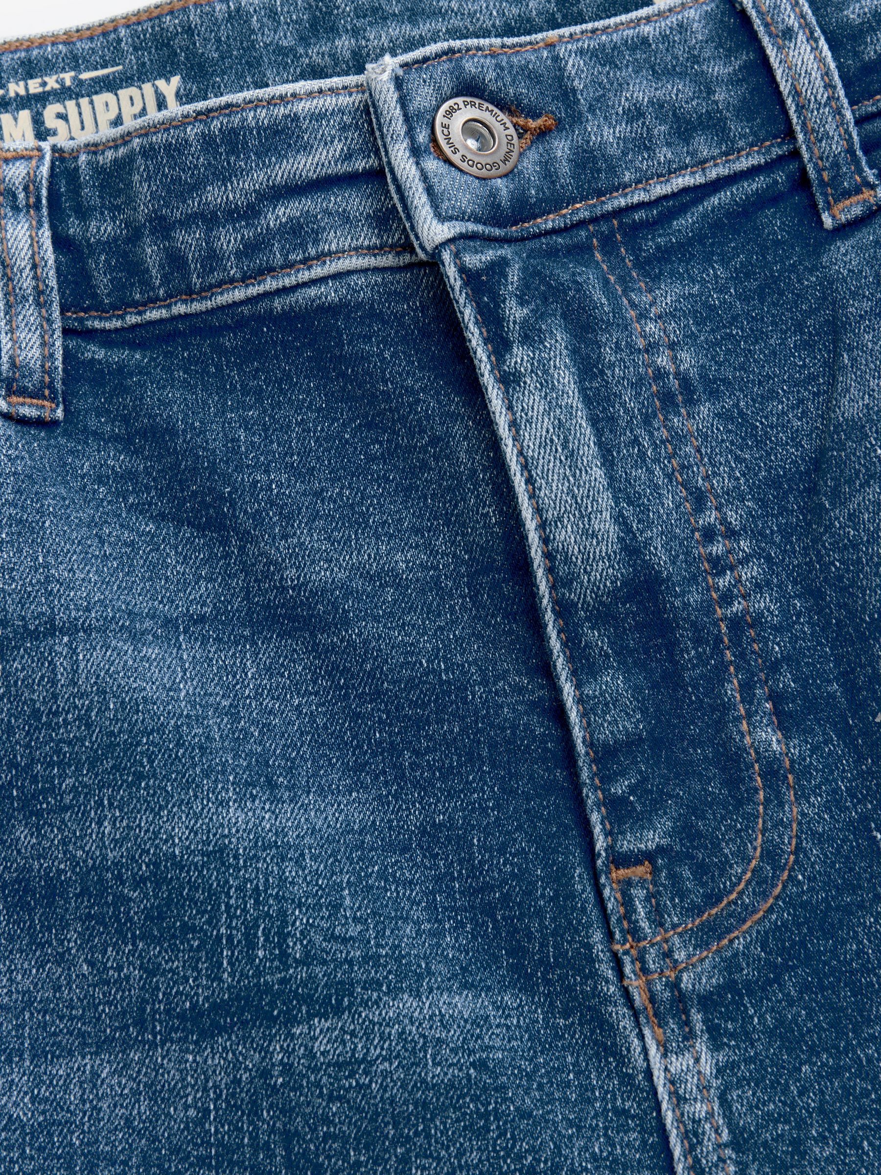 Mediumblauw - Standaard toelopende pasvorm - Vintage wash denim jeans