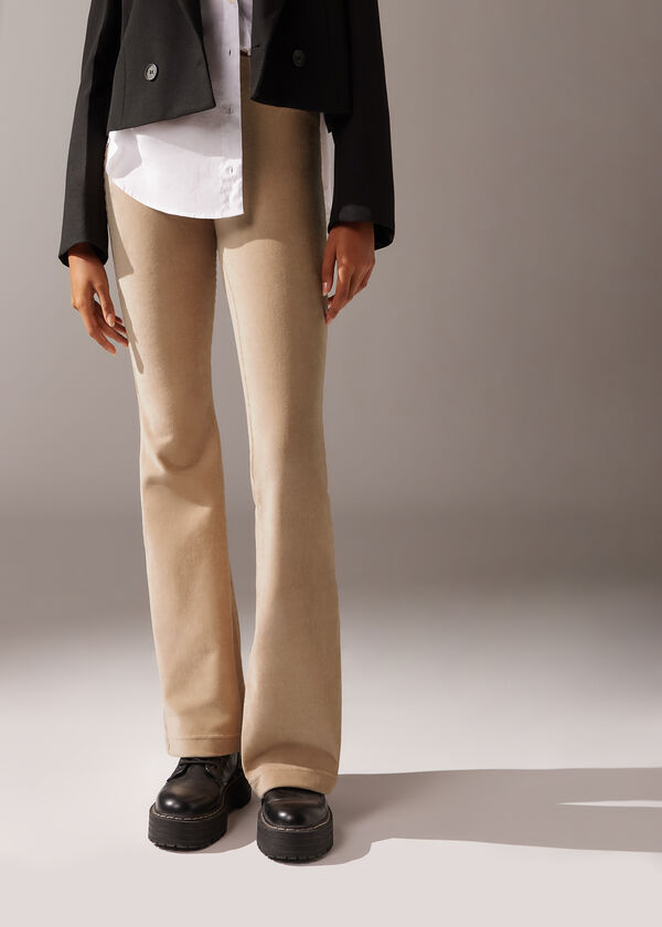 Calças legging flare de veludo cotelê