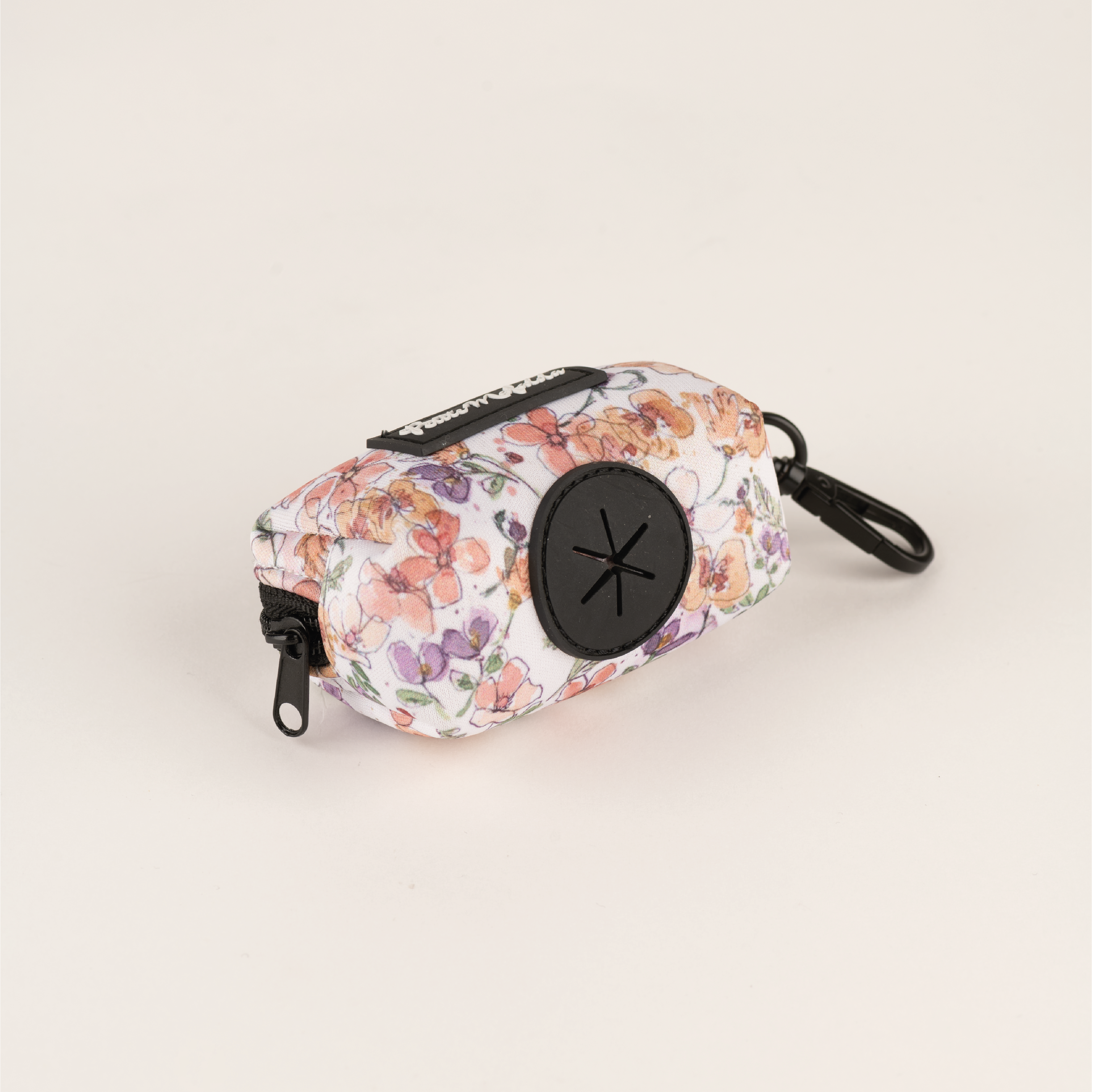 Porta-sacos Petite Mafalda com estampa floral rosa para cães