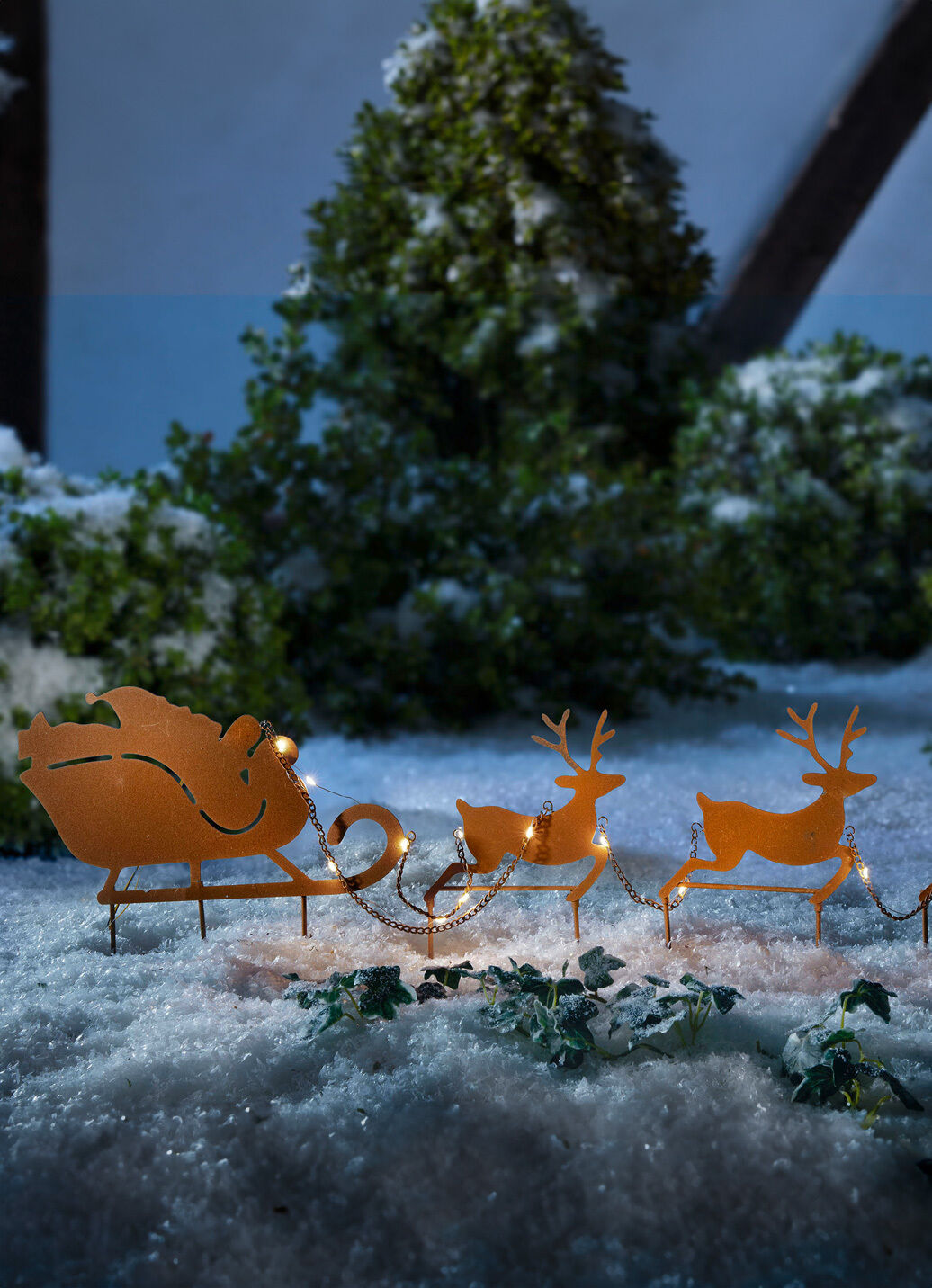 Weihnachtsmann mit Rentierschlitten