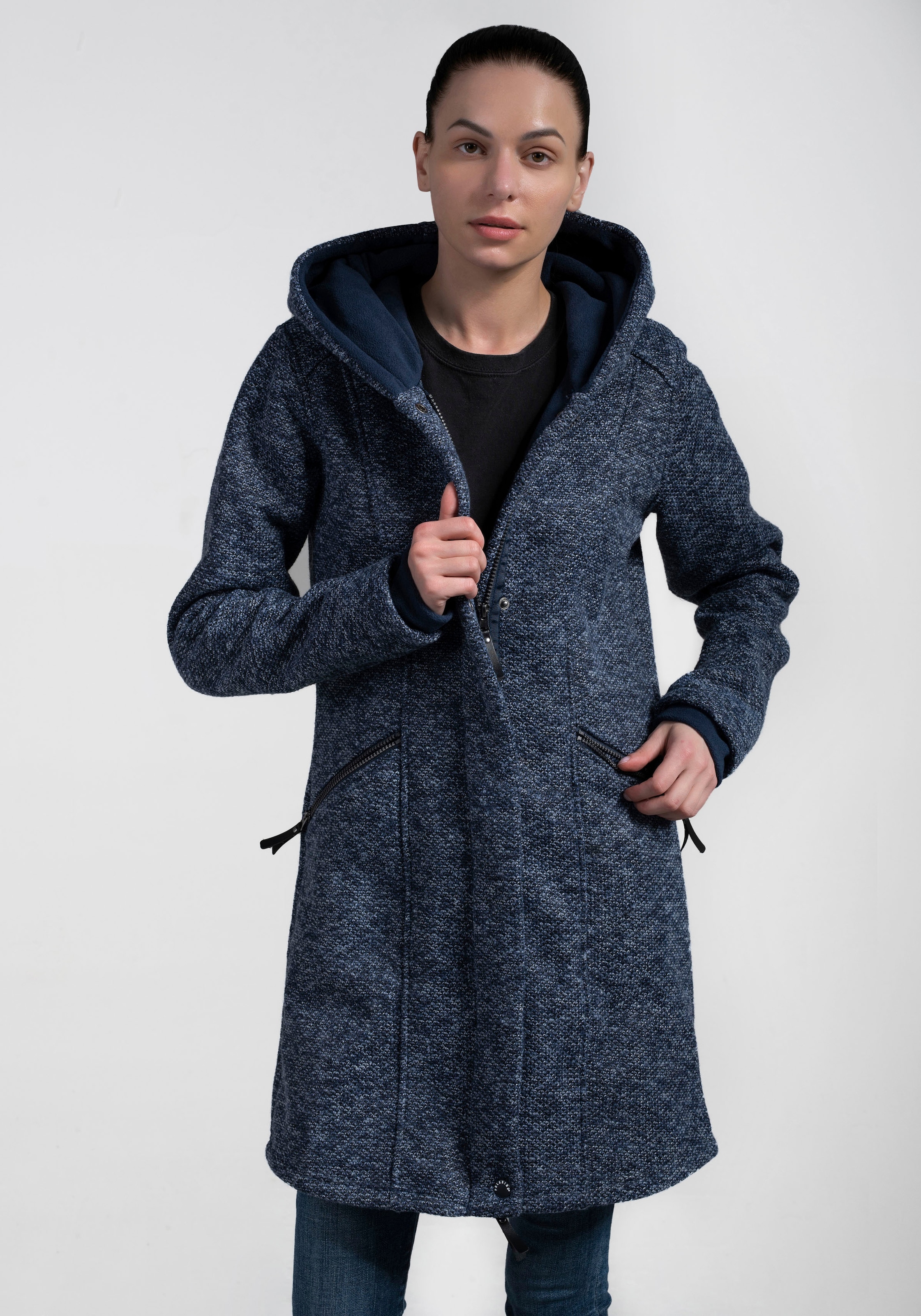 Polarino Strickmantel , atmungsaktiv und wärmeisolierend. Strickoptik aussen, Fleece innen.