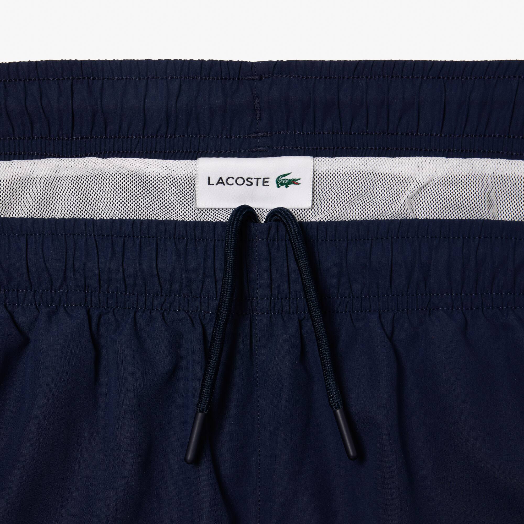 Mittellange Badehose mit Slogan Badebekleidung - Blau - Lacoste - Herren