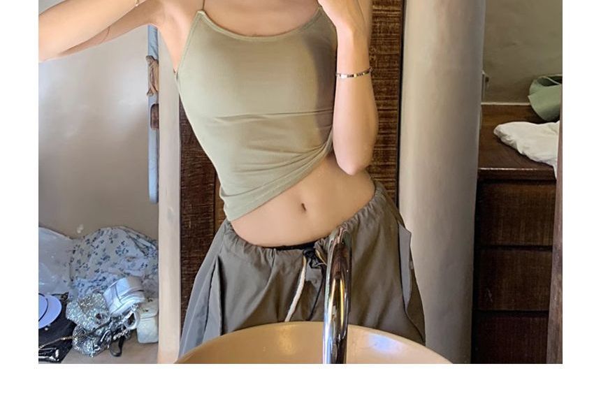 Gwendolyn - Haltertop met open rug en gewatteerde crop top