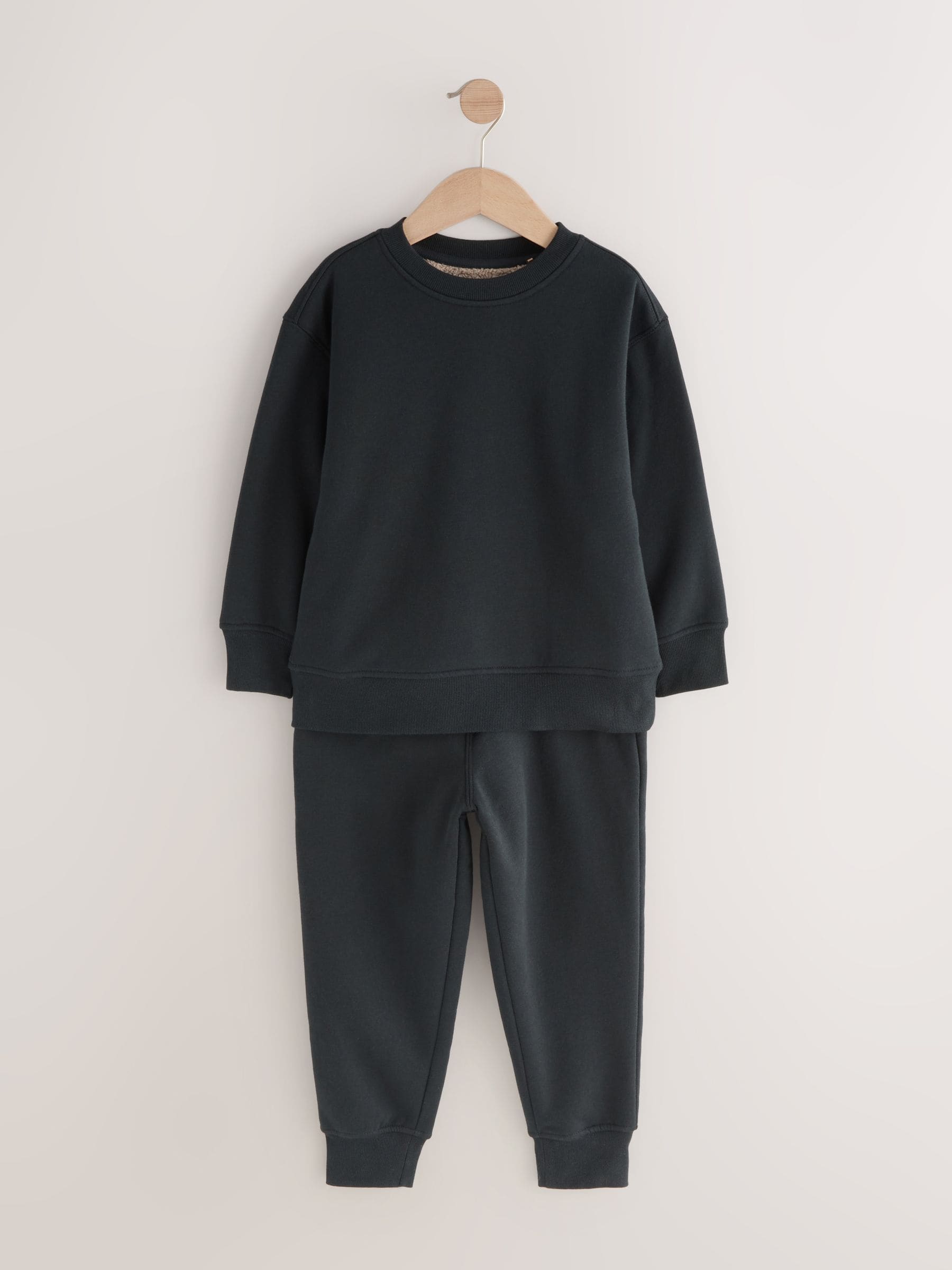 Zwart - Enkele behaaglijke fleece pyjama (3 - 16 jr)
