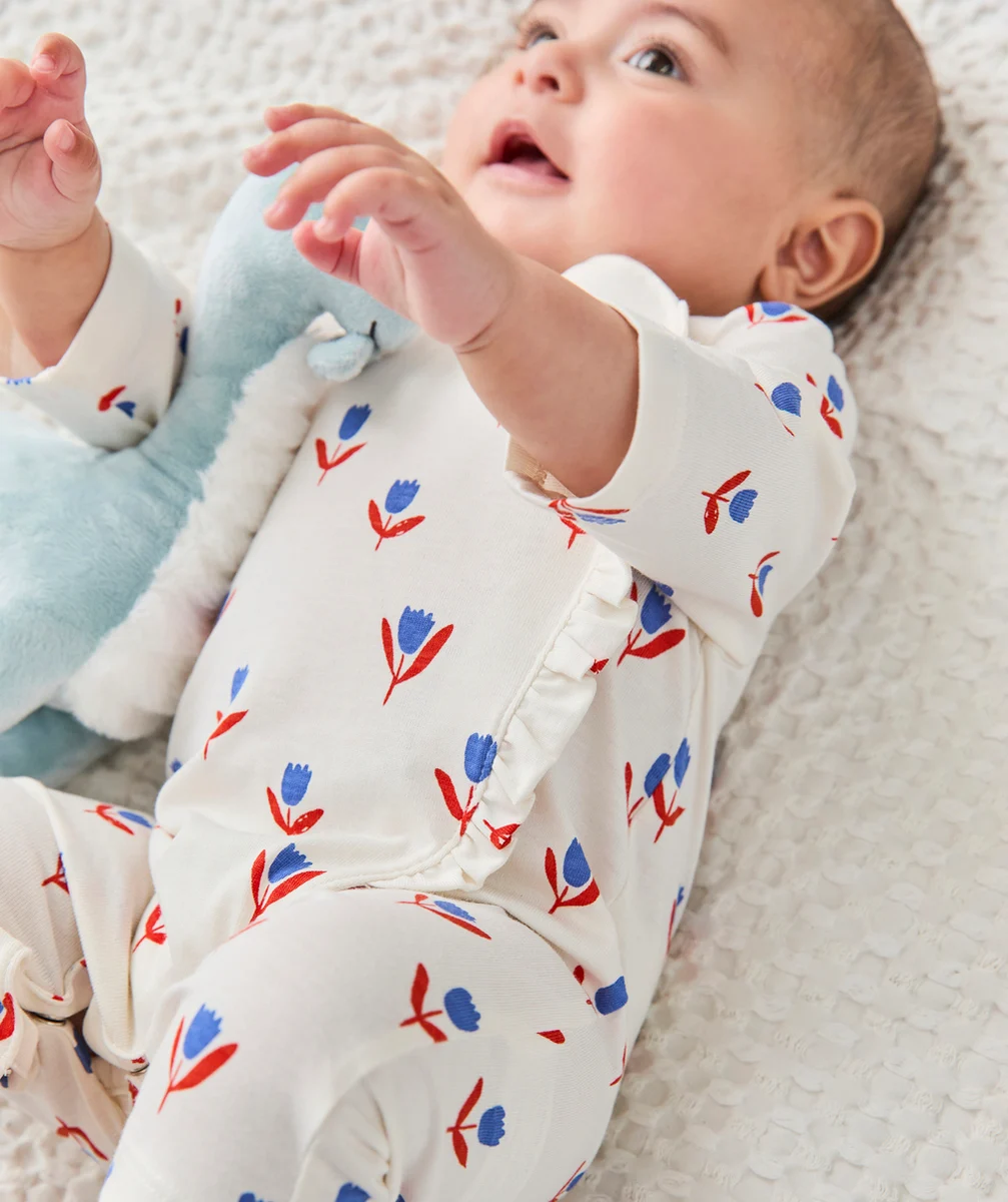 dors bien bébé en coton bio blanc imprimé avec fleurs bleu et rouge
