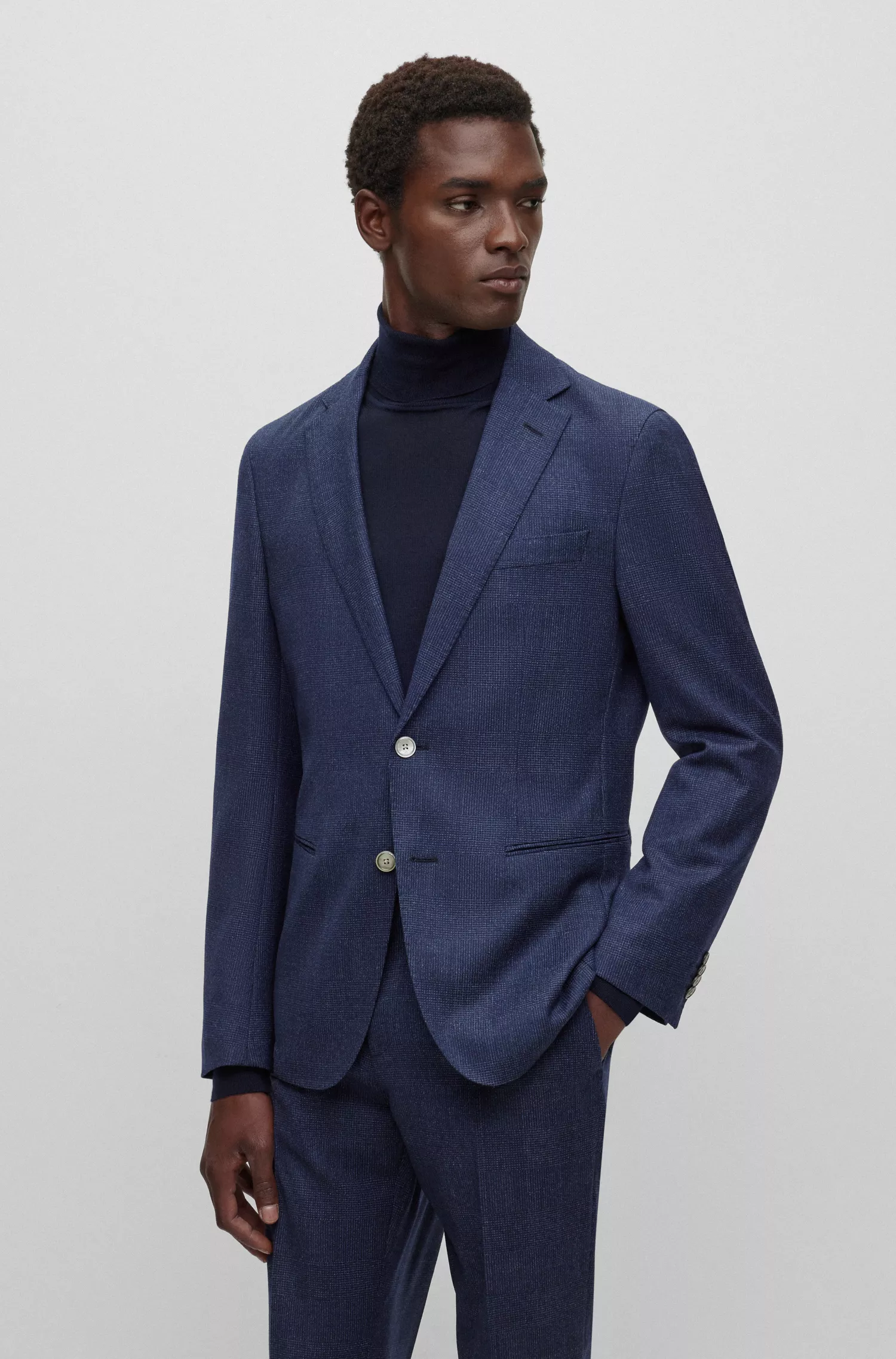 Terno BOSS preto slim fit em lã elástica xadrez.