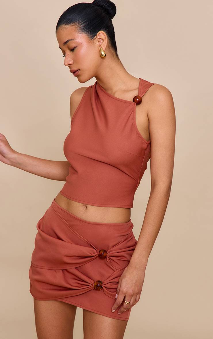 Rouille Haut Asymétrique Avec Détails De Perles