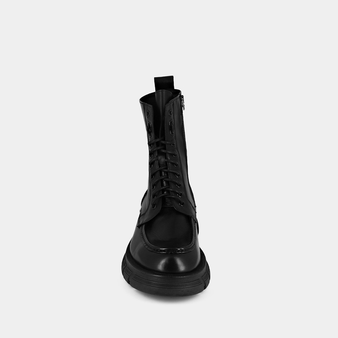 Boots à lacets et semelles épaisses  en cuir noir
