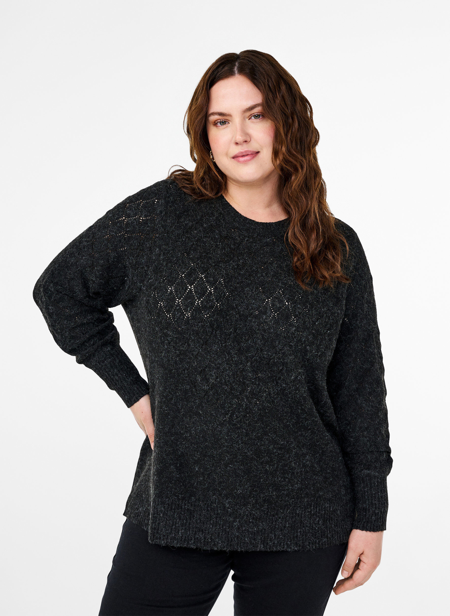 Strikbluse med hulmønster