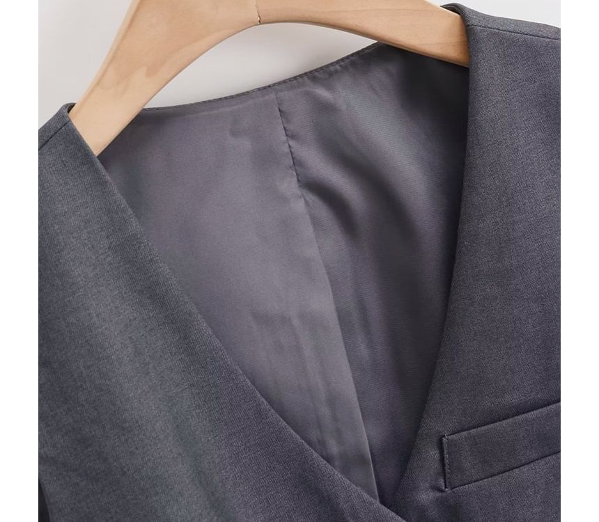 JOWI - V-hals effen knoopvest