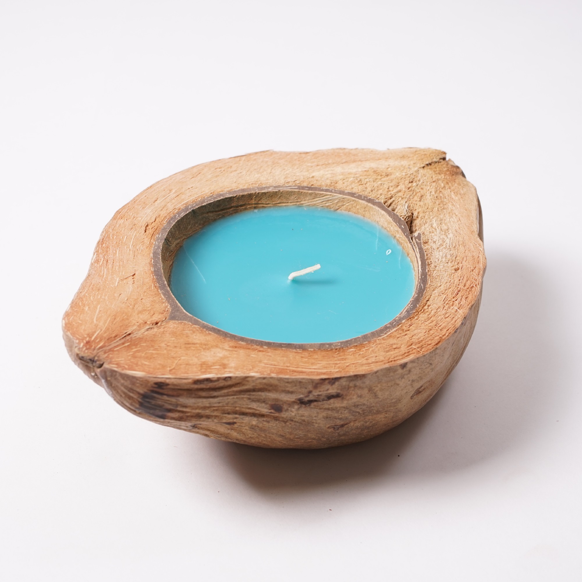 Duftkerze 'Island Spices', in Kokosnusshälfte, braun, blau, Ø 13-17 cm von fischer's lagerhaus