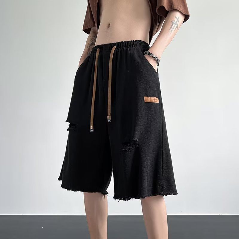 Femilina - Mid Rise Washed Distressed Denim Shorts