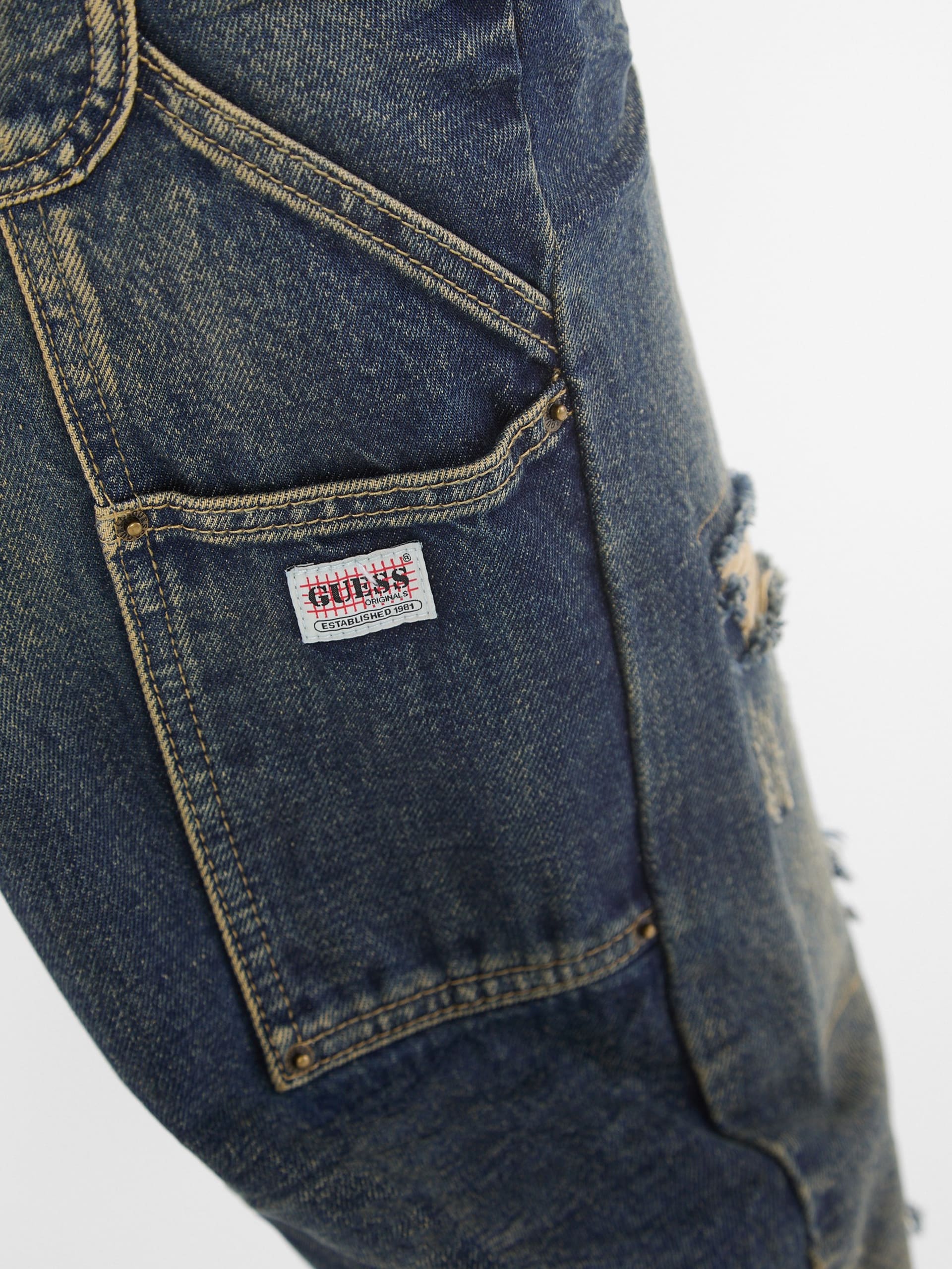 Calça jeans GUESS Originals estilo carpinteiro com efeito desgastado