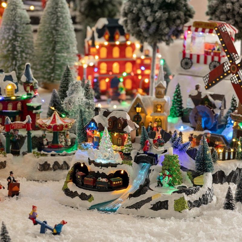 Fééric Lights and Christmas - Verlicht Kerstdorp - Trein met Animatie - 30,8 x 19 x 18,5 cm - LED Verlichting