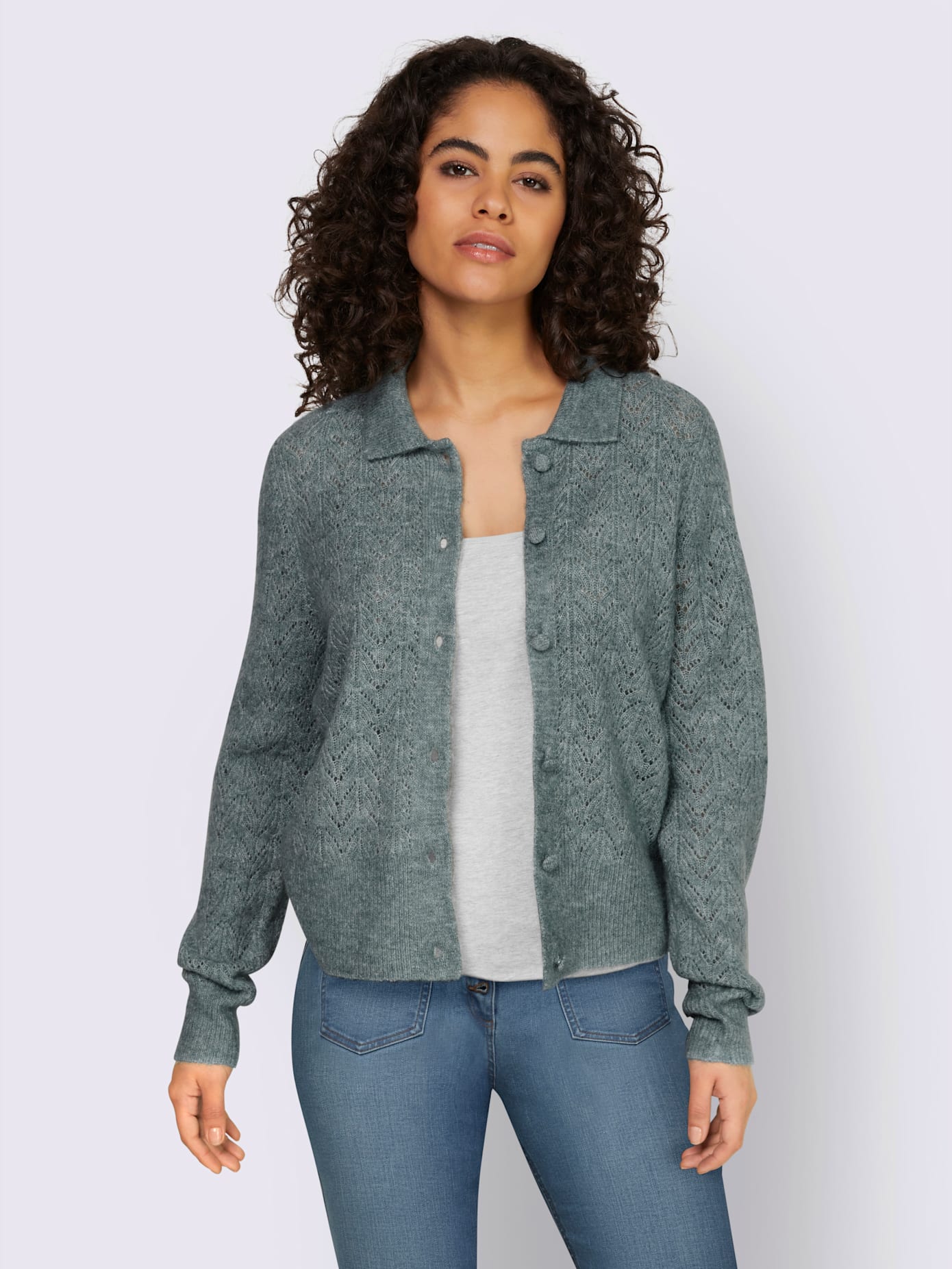 Veste en tricot motif ajouré transparent discret