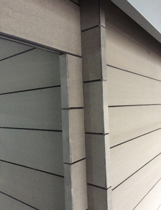 Abri de jardin Green Outside toit plat en composite coloris gris ép.28 mm surface extérieure 10 m²
