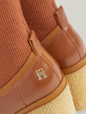Botas de cano alto com sola de crepe de couro