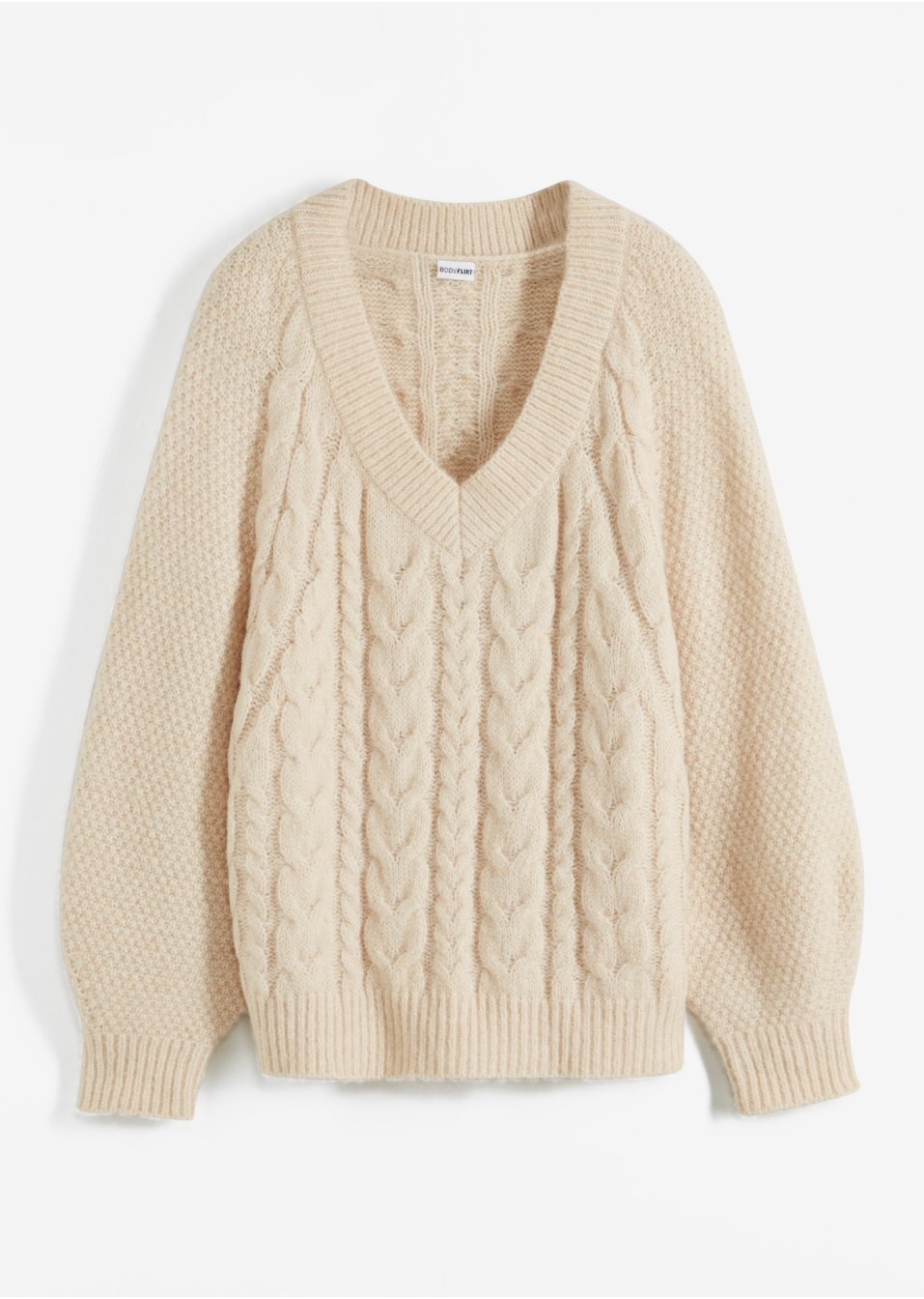 Pull à motif torsadé