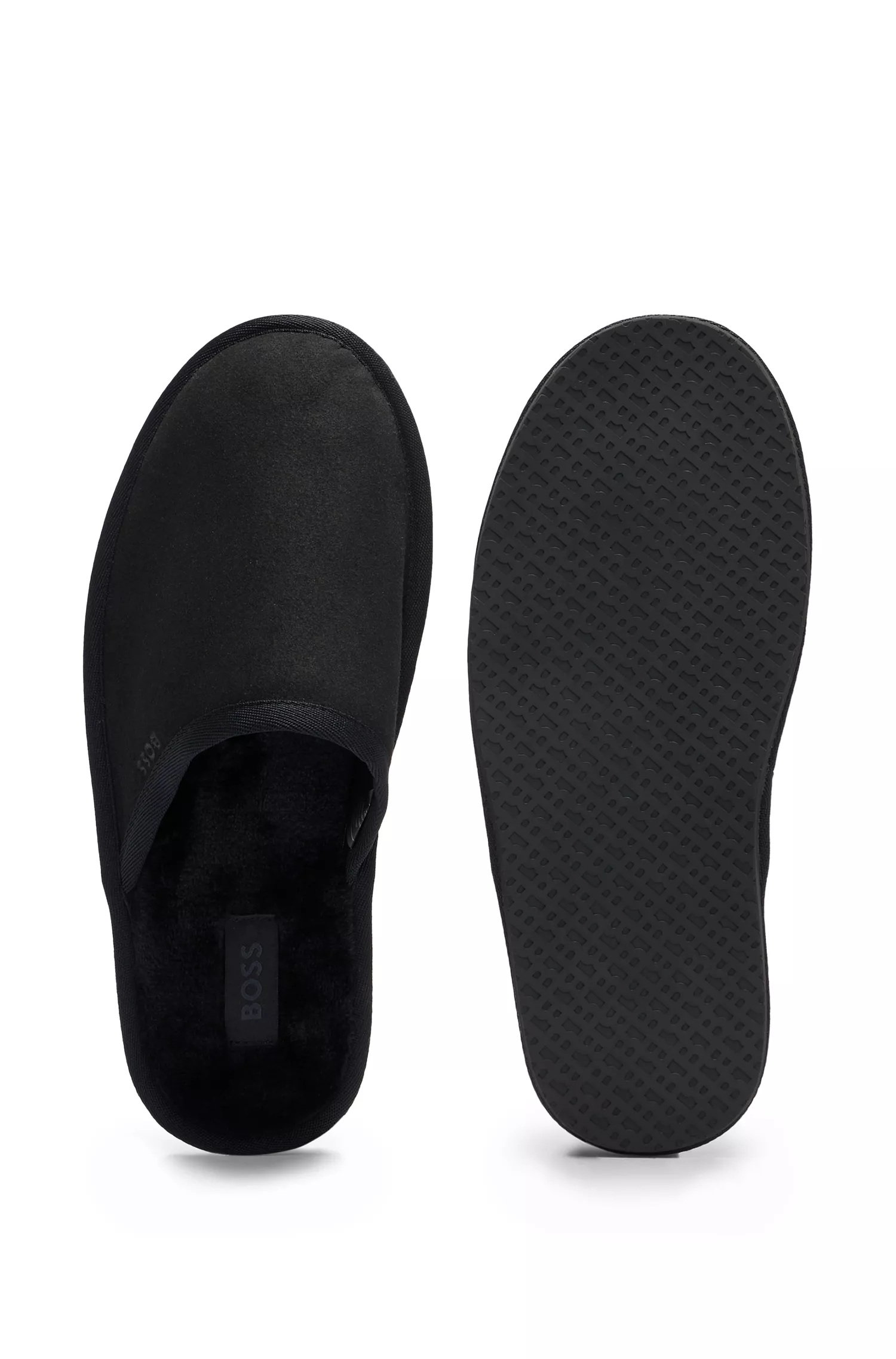 Chinelo BOSS preto em camurça sintética com sola de borracha.