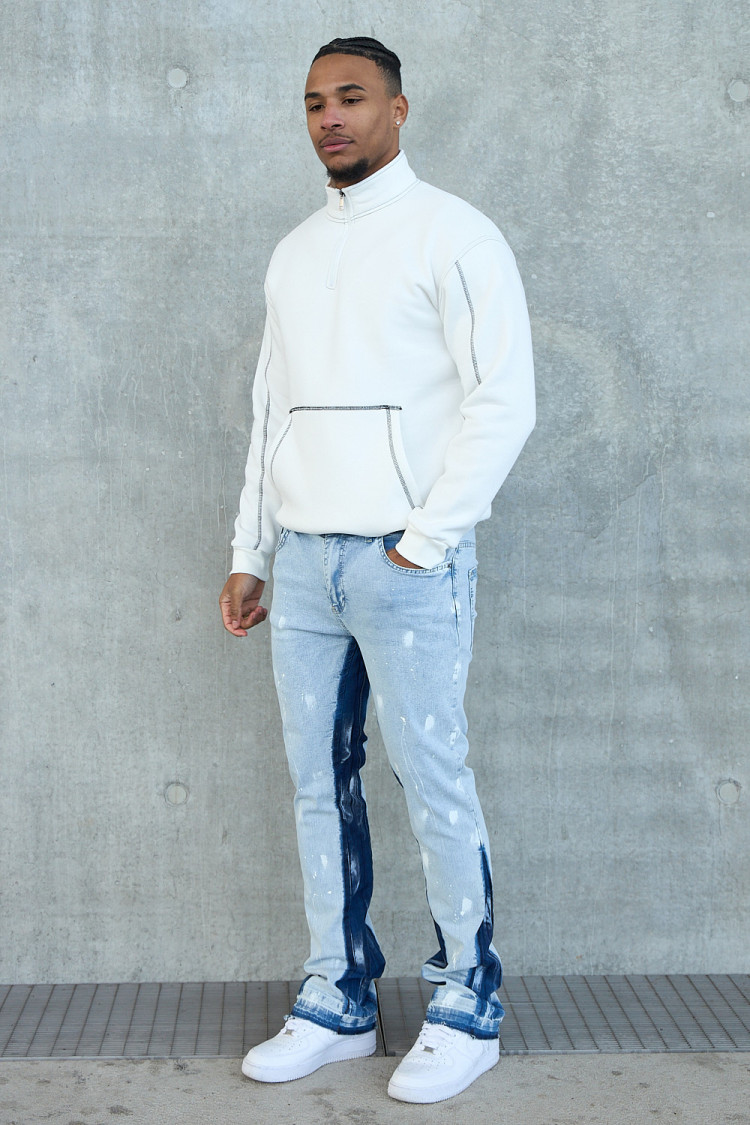 Jean bleu clair taché à empiècement bleu clair