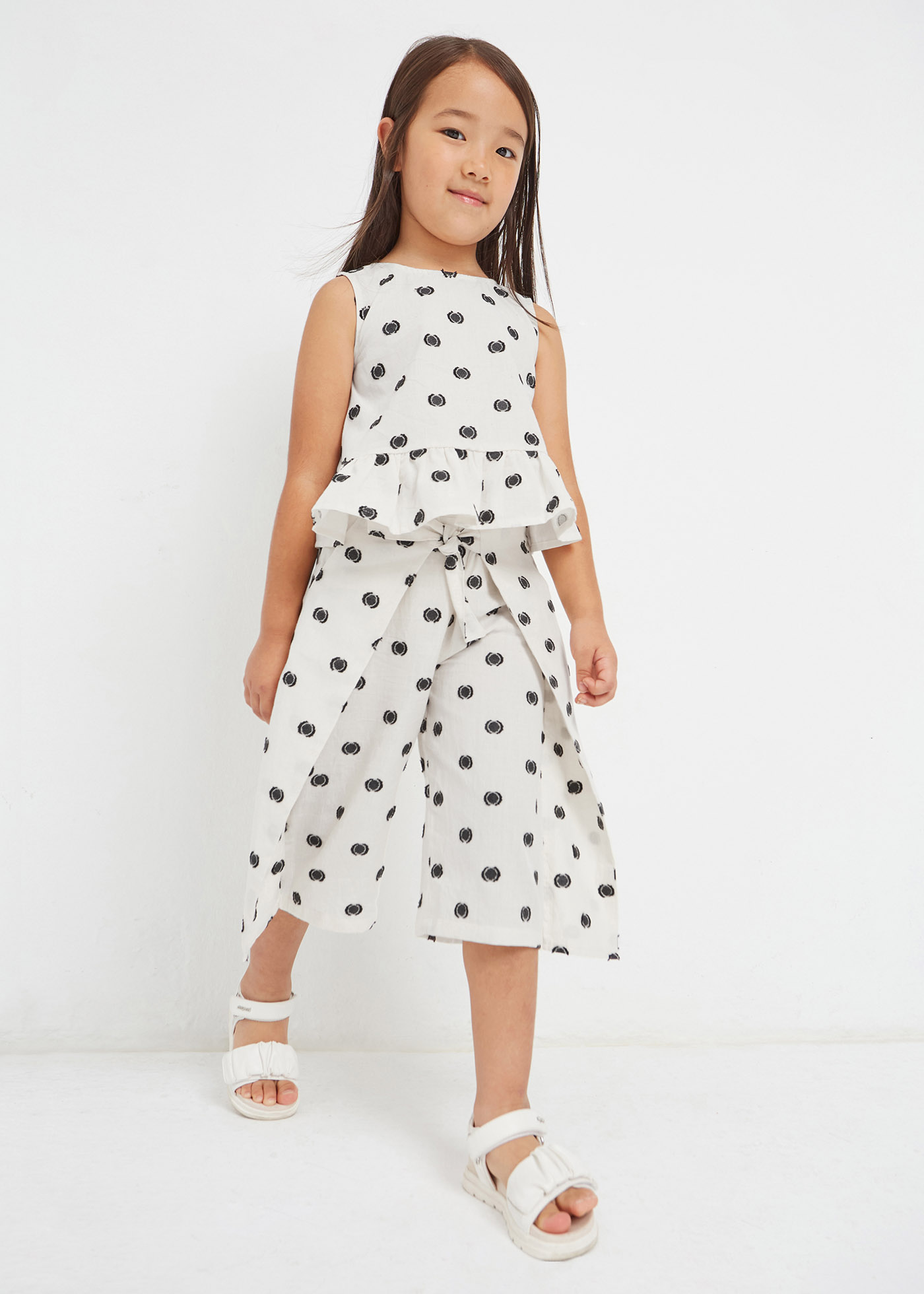 Calças cropped de algodão estampadas para meninas